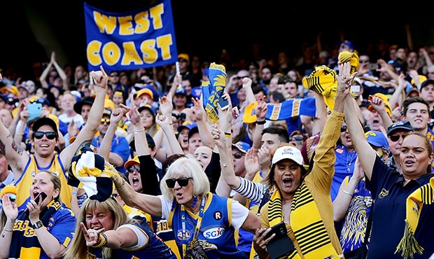 AFL 2018 Second Preliminary Final - West Coast v Melbourne PERTH, AUSTRALIA - SEPTEMBER 22: West Coast fans celebrate the win during the 2018 AFL Second Preliminary Final match between the West Coast Eagles and the Melbourne Demons at Optus Stadium on September 22, 2018 in Perth, Australia. (Photo by Will Russell/AFL Media)